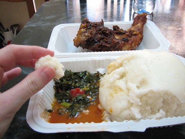 Eating nshima traditional way